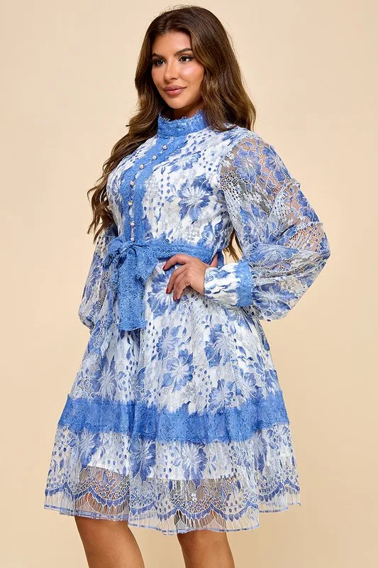 A Short Blue Lace Dress With Blue And White Lace Trim