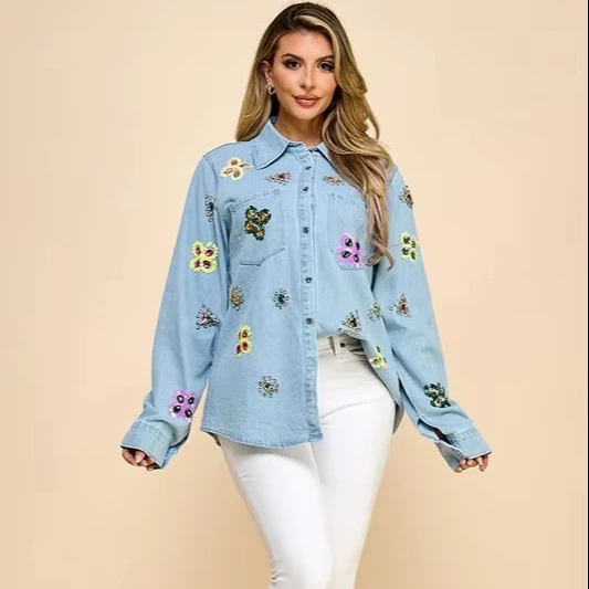 A Long-sleeved Denim Shirt With Lady's Hand-sewn Sequins And Colorful Faux Diamonds.