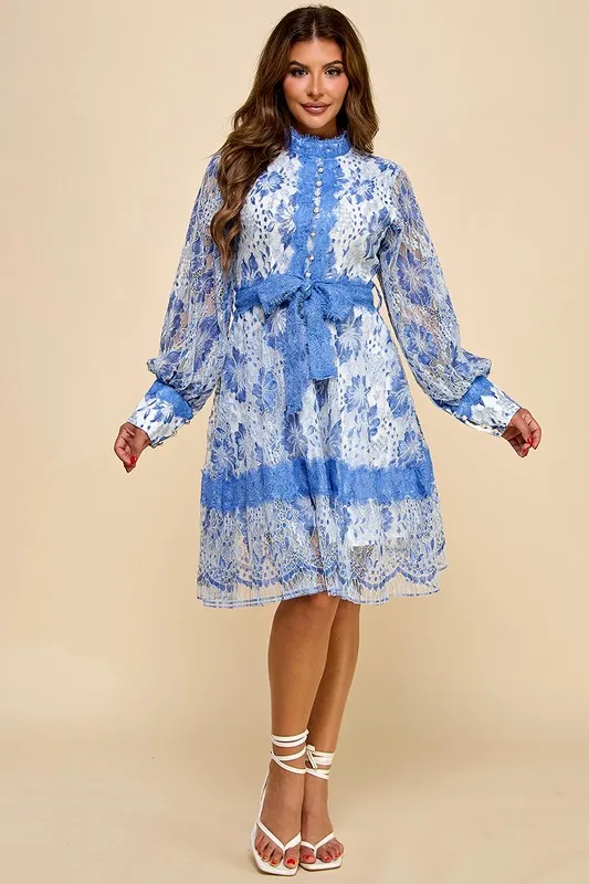 A Short Blue Lace Dress With Blue And White Lace Trim